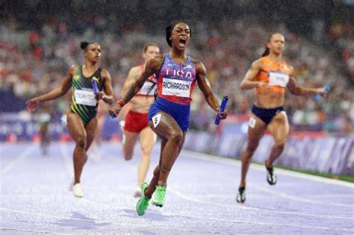 Sprinter Sha'Carri Richardson Celebrates Her 100 Meters Win with Warm